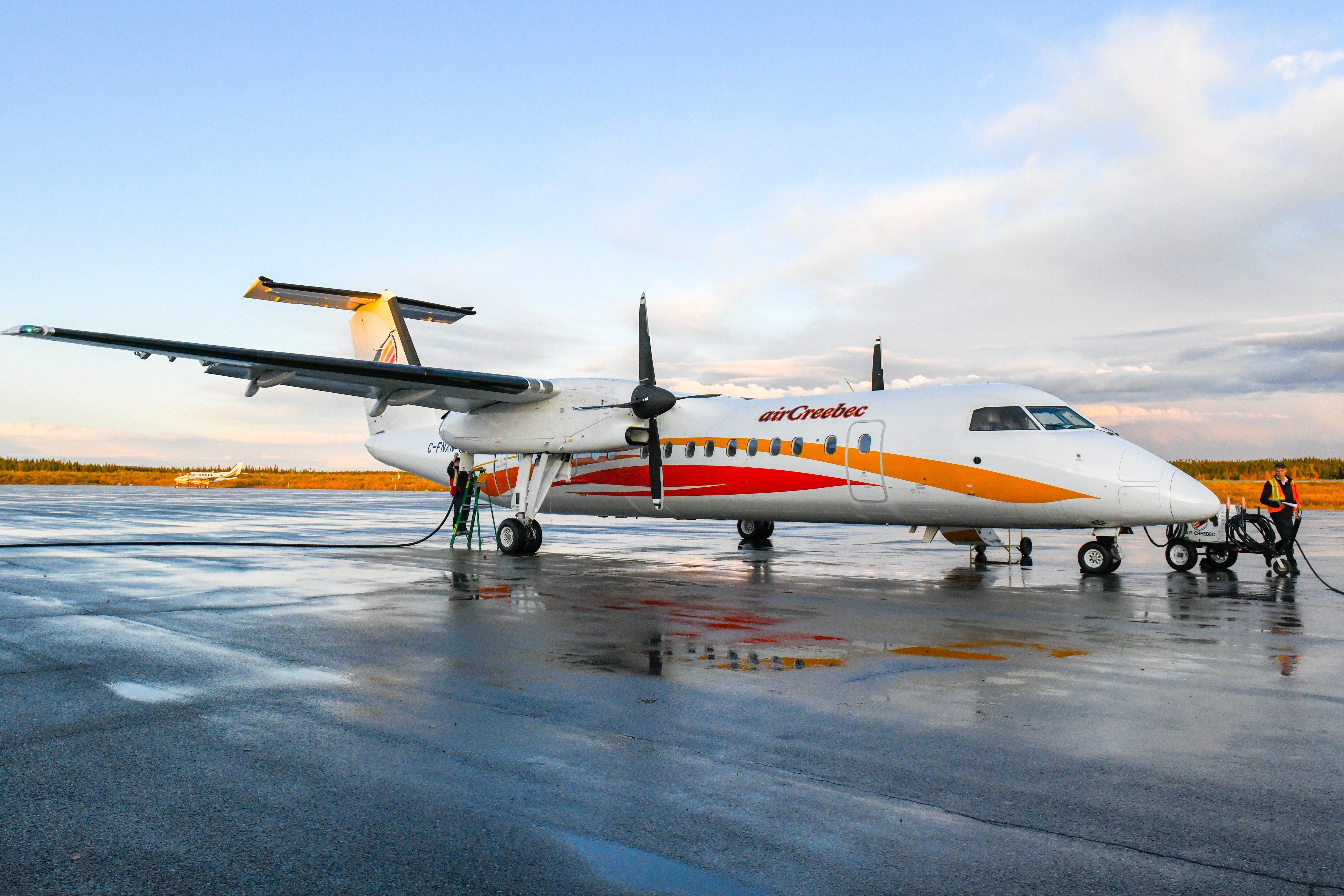 Air Creebec plane sitting on runway