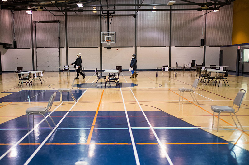 Women walking in Youth Centre gym