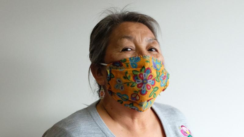 Elder wearing mask (Mary Jane Petawabano)