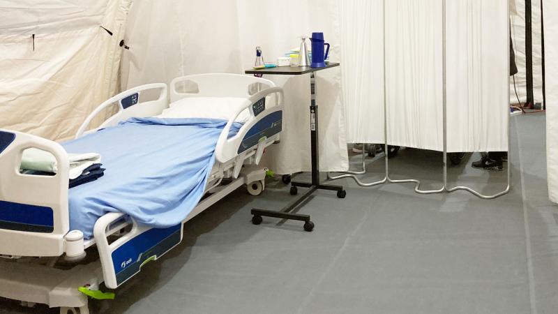 Bed inside mobile hospital unit