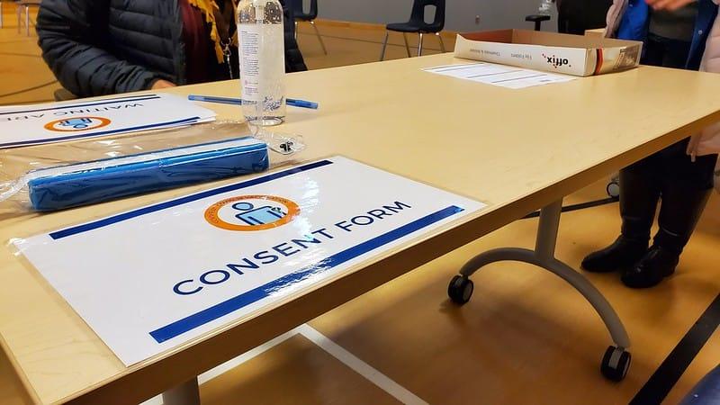 Consent form sign on table