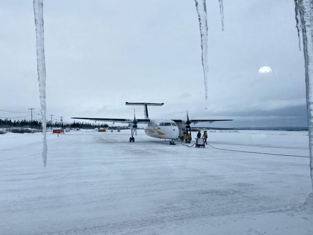 Plane sitting on frozen runway