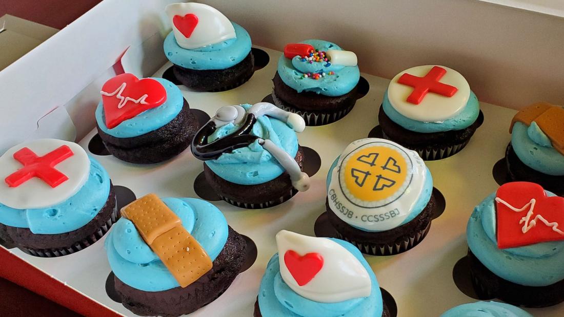 Cupcakes with medical-themed icing