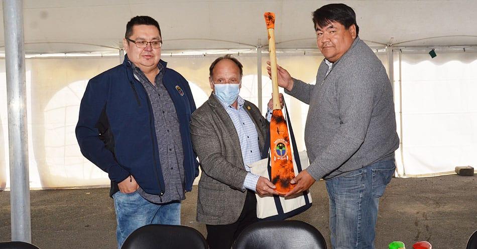 CHB Executive-Director Daniel St-Amour receives gift of a paddle from Waswanipi Chief and Deputy Chief