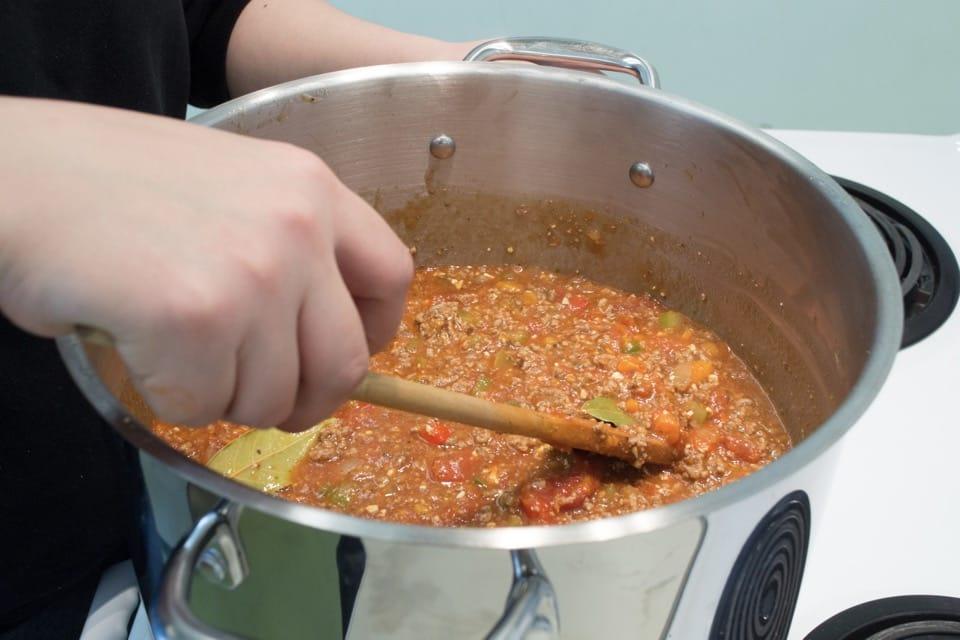 Making stew in a steel saucepan