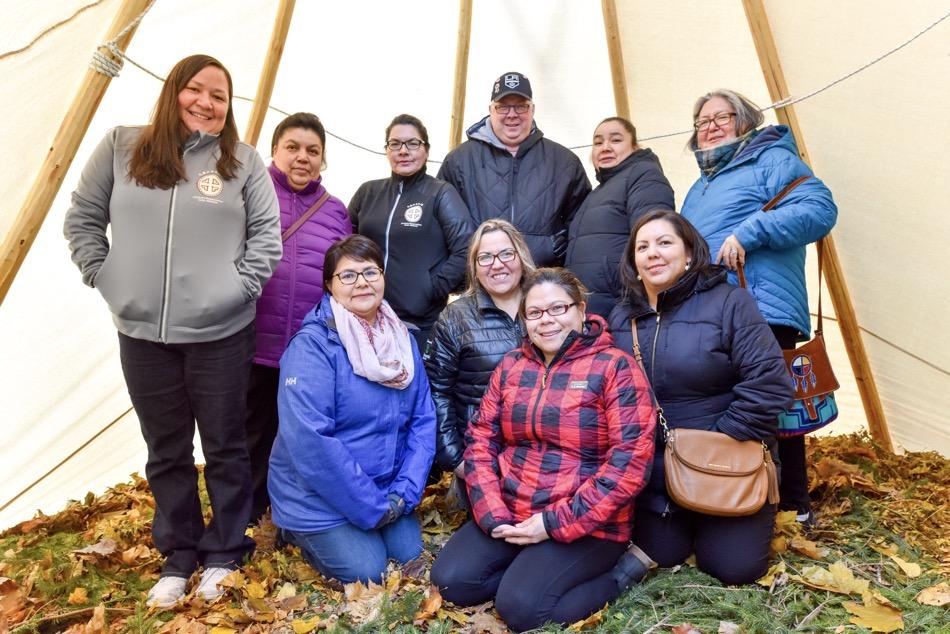 Group of healthcare workers in a teepee