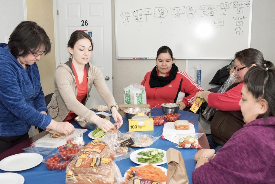 Group of women preparing healthy food