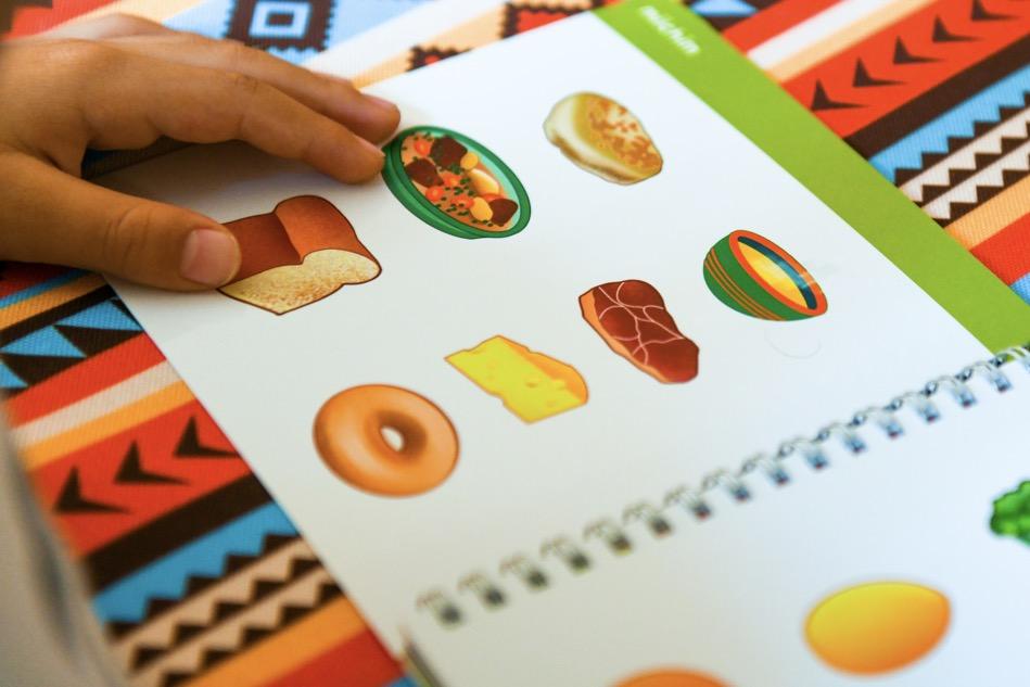 Illustrations of different foods in a book